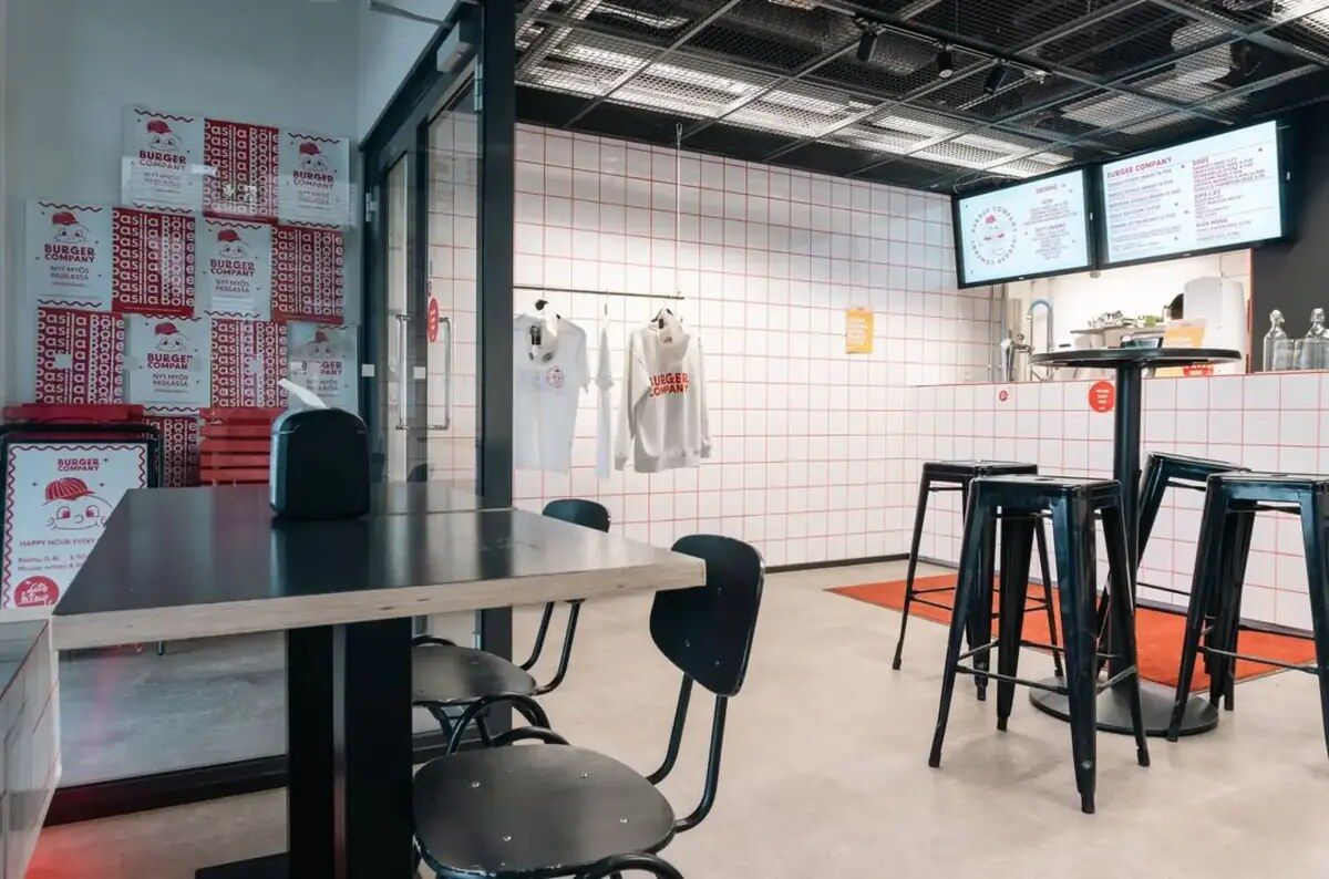 Burger Company restaurant interior with its service counter and brand details